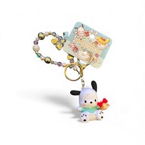 Sanrio Black and White Pochacco Keychain with Red Bow